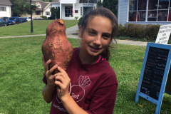 Abby-holding-big-sweet-potato-2018-2