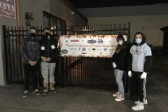 Harmony-Cafe-Fundraiser-2020-outside-by-sign-scaled